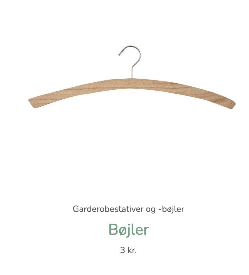 Eight shirts arranged on table in black, olive, grey, blue, white, red, mustard, and green.